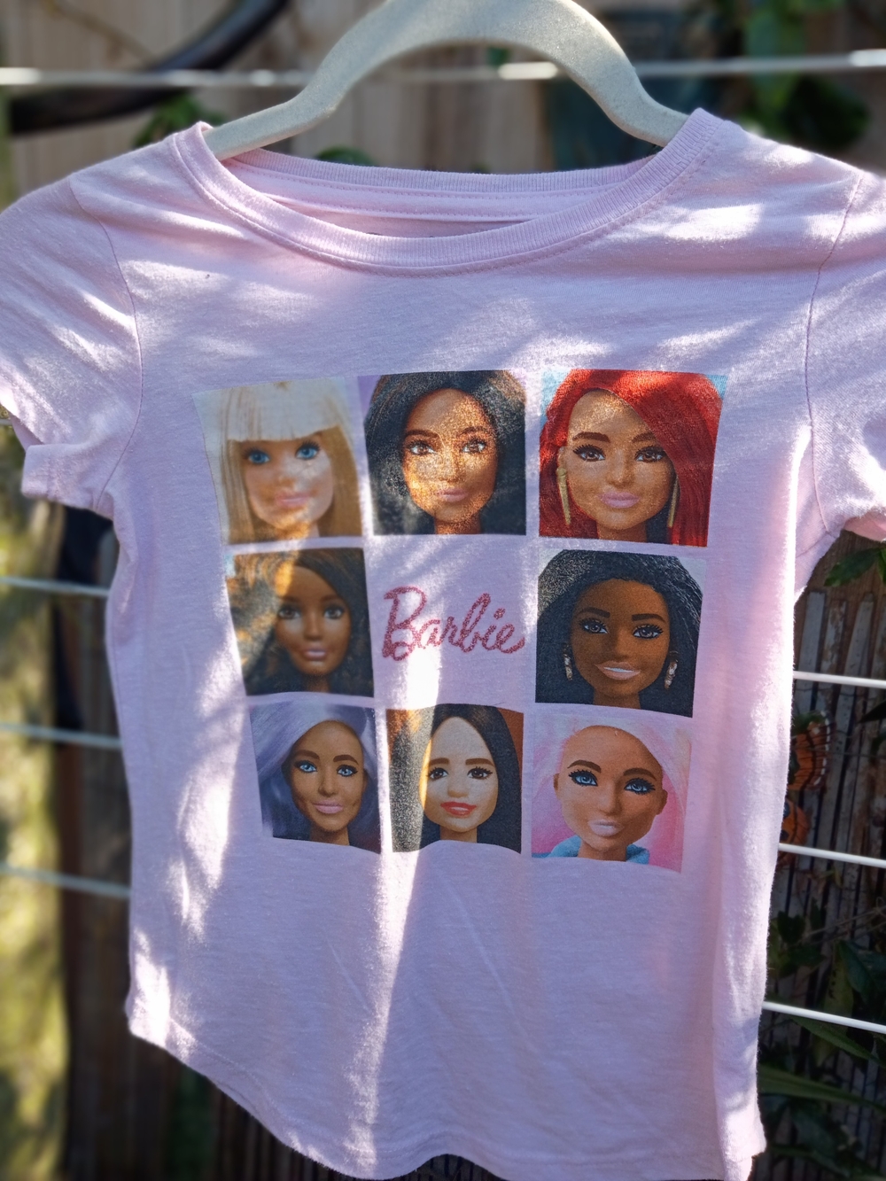 Barbie Light Pink Tee with Multicolor Doll Portrait Grid